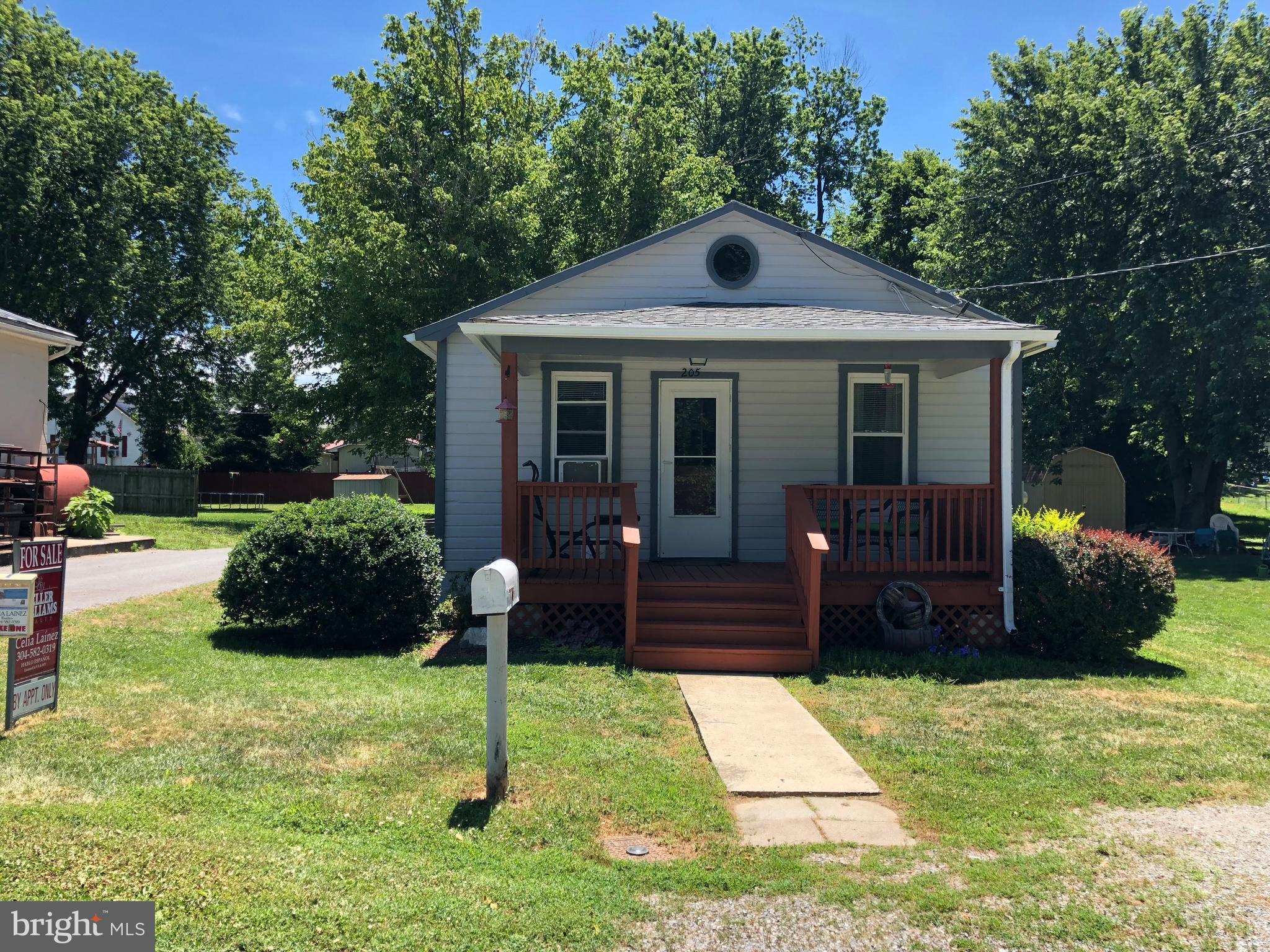 205 East 7th Avenue Ranson, WV 25438 - Photo 2 of 29 a front view of a house with a yard
