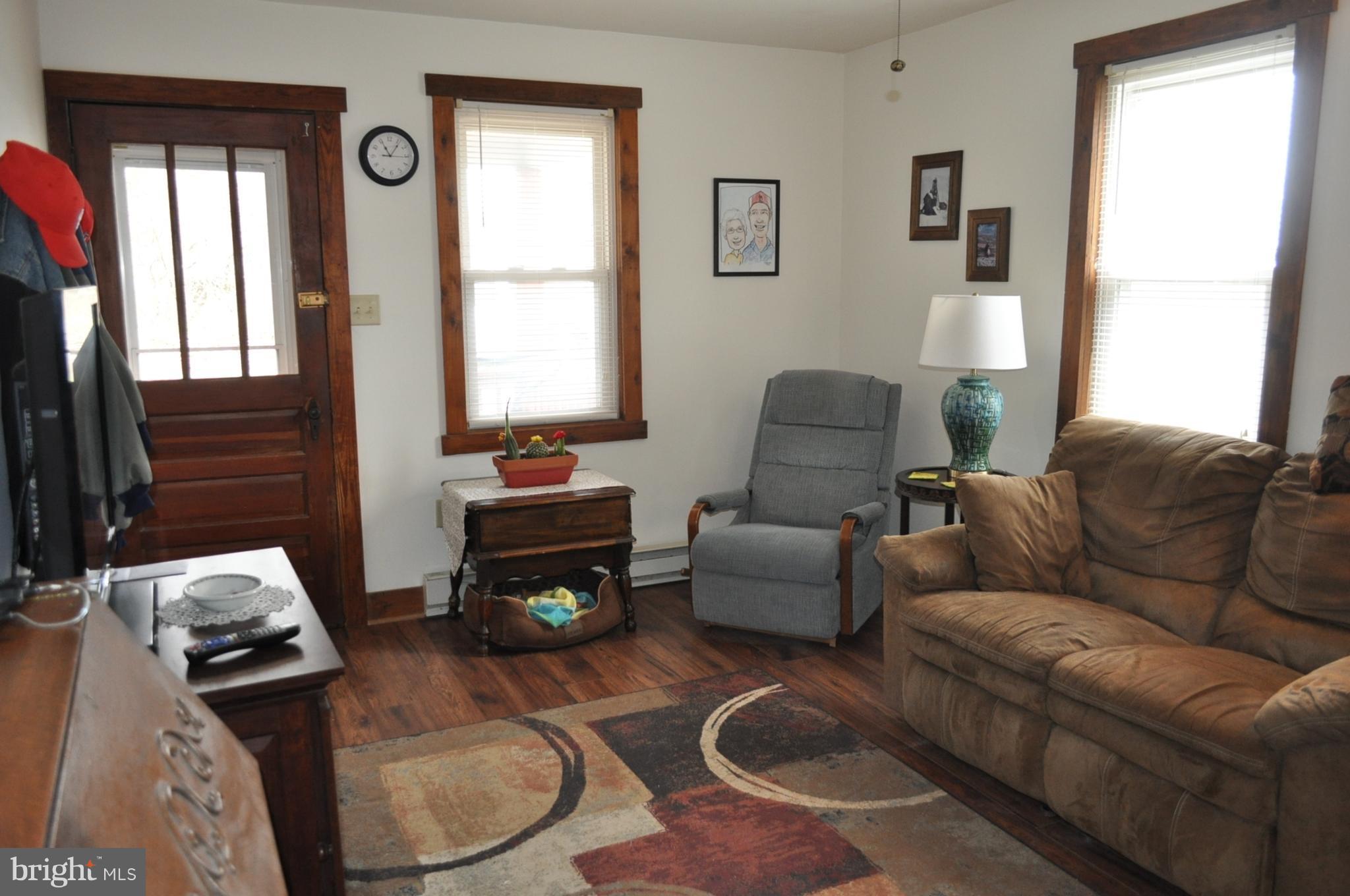 205 East 7th Avenue Ranson, WV 25438 - Photo 13 of 29 a living room with furniture and a window