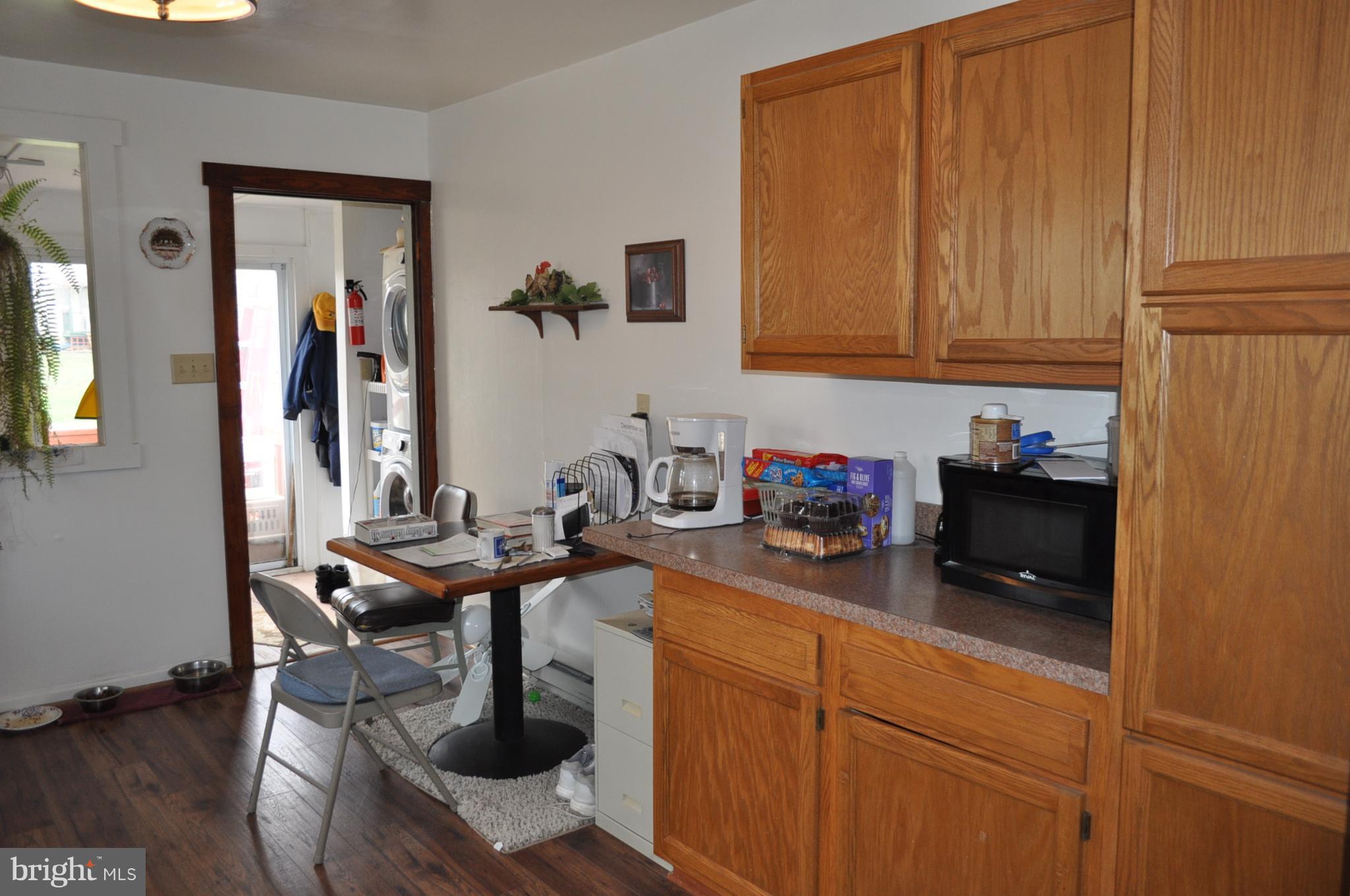205 East 7th Avenue Ranson, WV 25438 - Photo 20 of 29 a kitchen with a sink cabinets and window