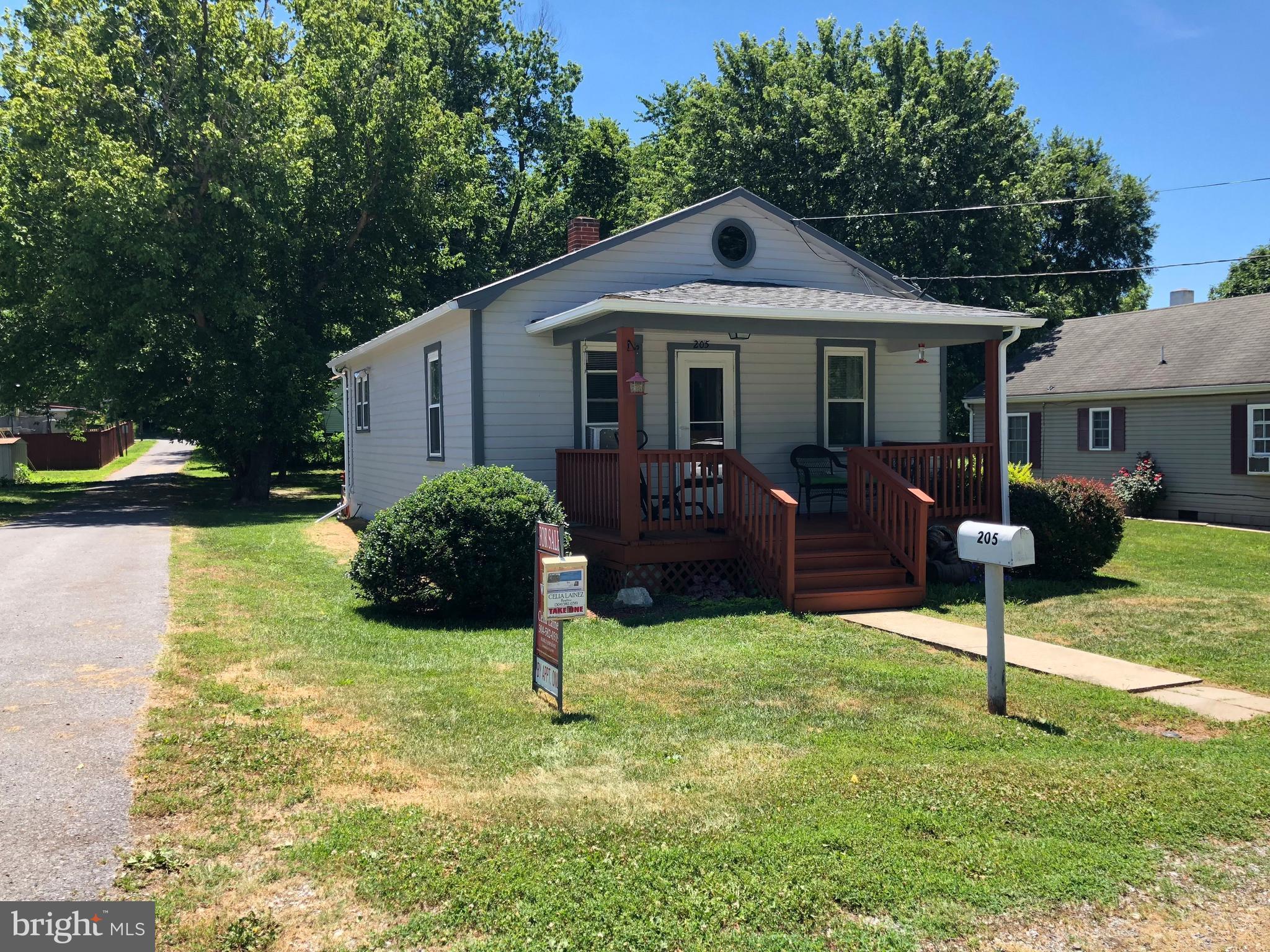 205 East 7th Avenue Ranson, WV 25438 - Photo 4 of 29 a front view of a house with a yard