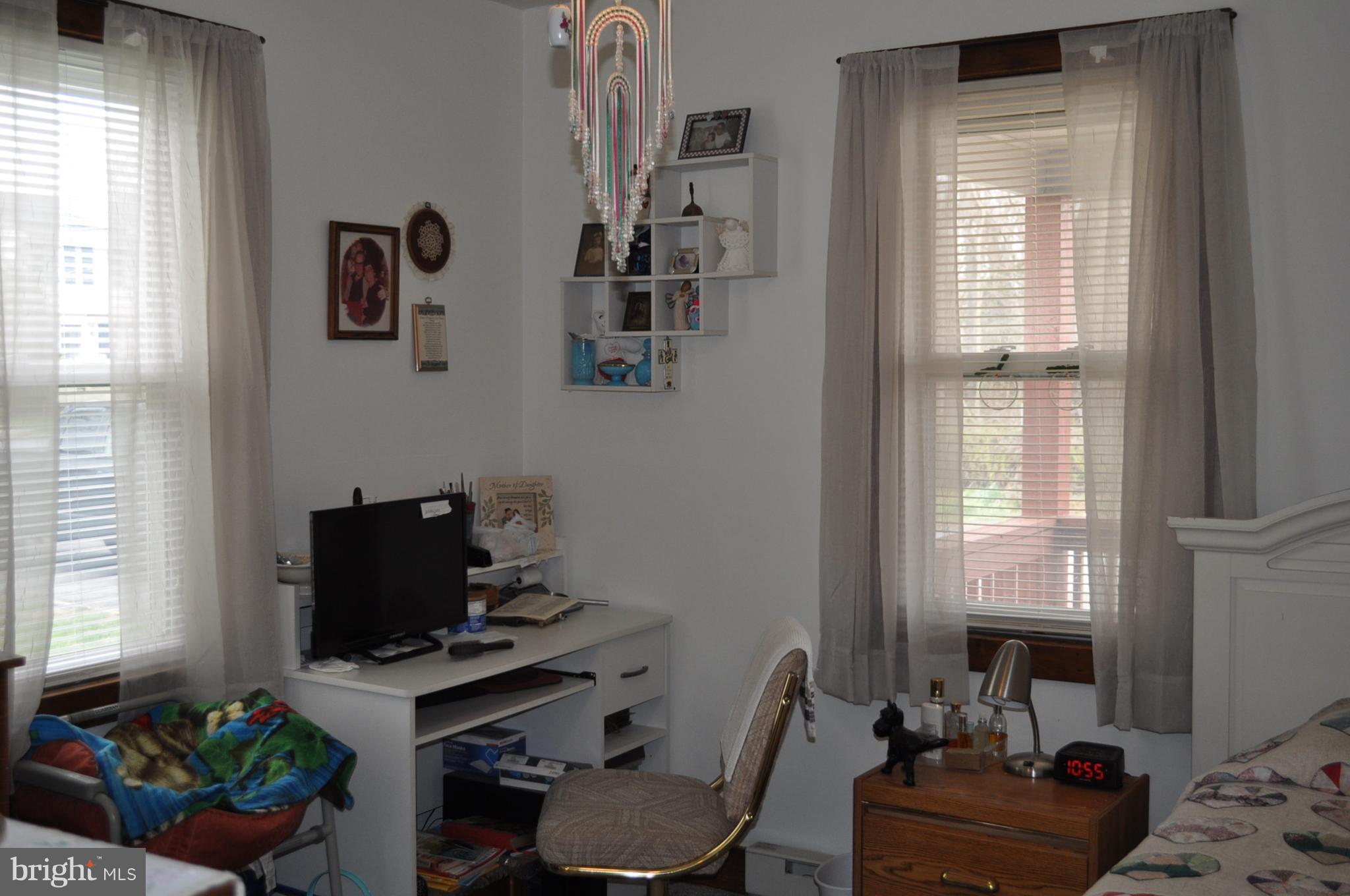 205 East 7th Avenue Ranson, WV 25438 - Photo 8 of 29 a view of a workspace with a window