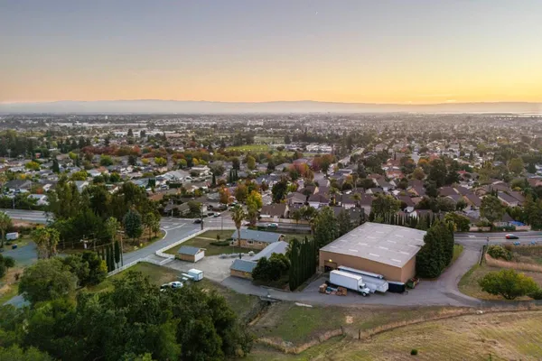 an aerial view of a house with a garden