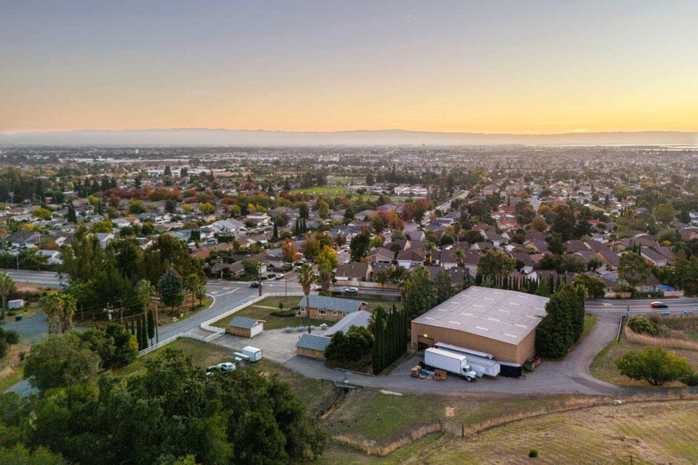 an aerial view of a house with a garden