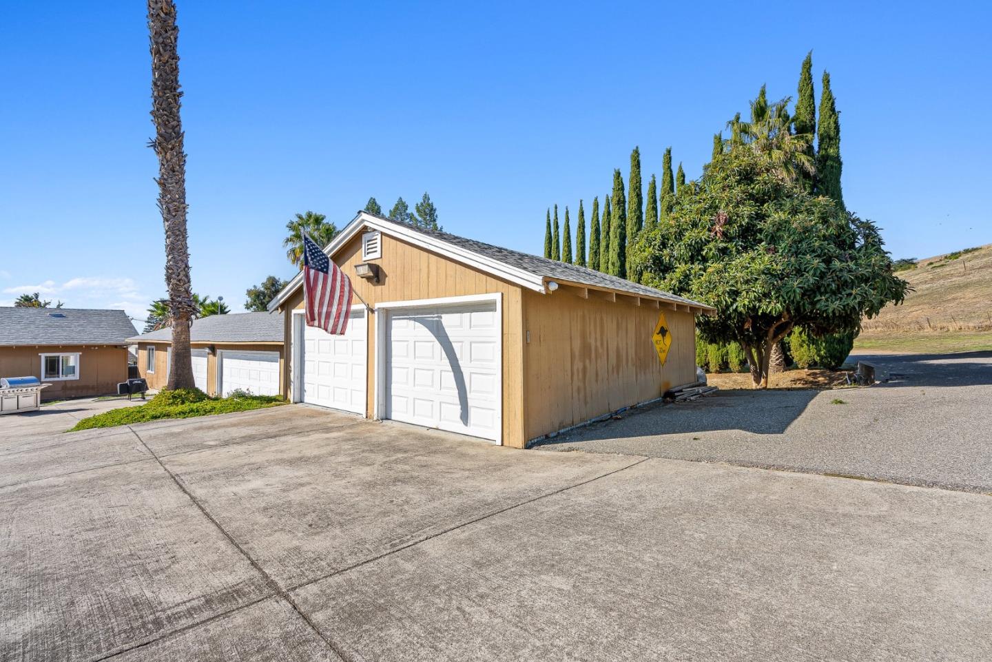 1995 Old Calaveras Road Milpitas, CA 95035 - Photo 16 of 53 a view of a house with a yard and garage