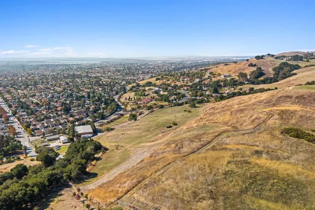 an aerial view of residential building and parking space
