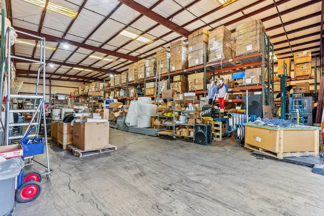 a room with gym equipment and windows