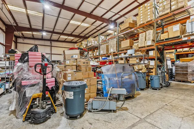a outdoor dining space with furniture and a store