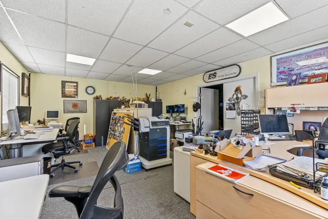 a view of a swimming pool with a garden