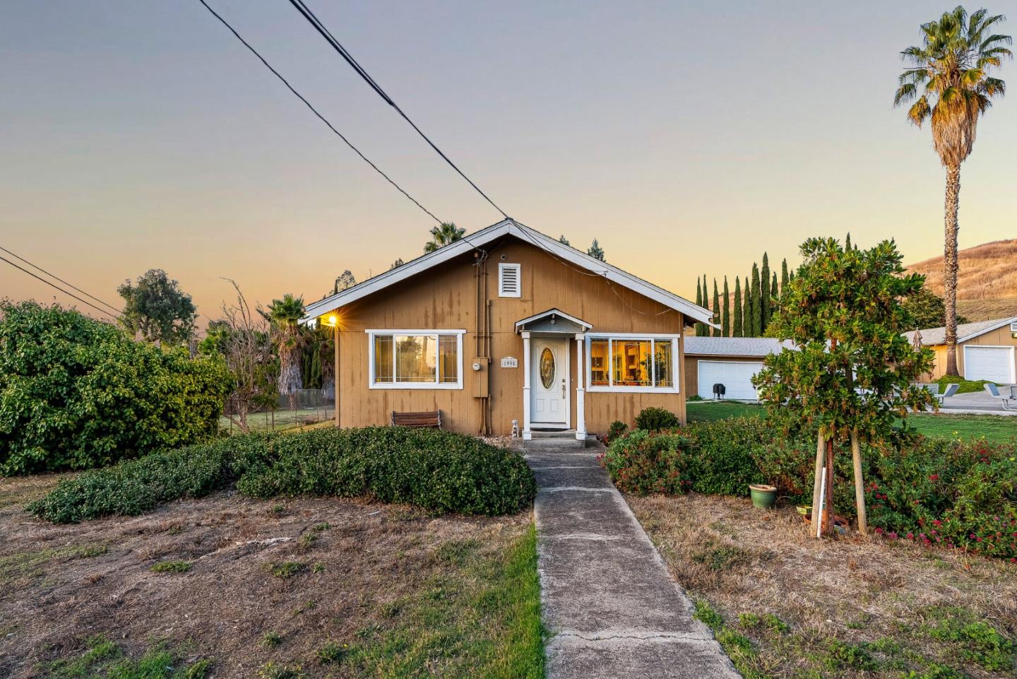 1995 Old Calaveras Road Milpitas, CA 95035 - Photo 29 of 53 a front view of house with yard and trees around