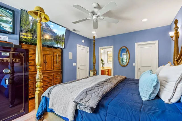 a kitchen with stainless steel appliances granite countertop a sink refrigerator and cabinets