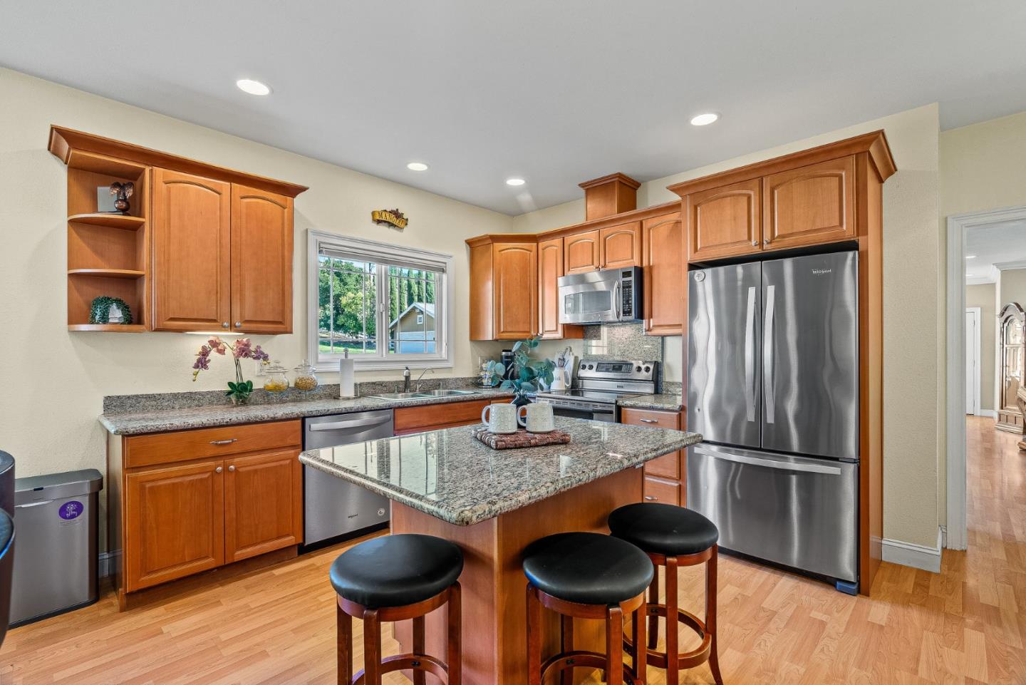 1995 Old Calaveras Road Milpitas, CA 95035 - Photo 49 of 53 a kitchen with stainless steel appliances granite countertop a sink refrigerator and cabinets