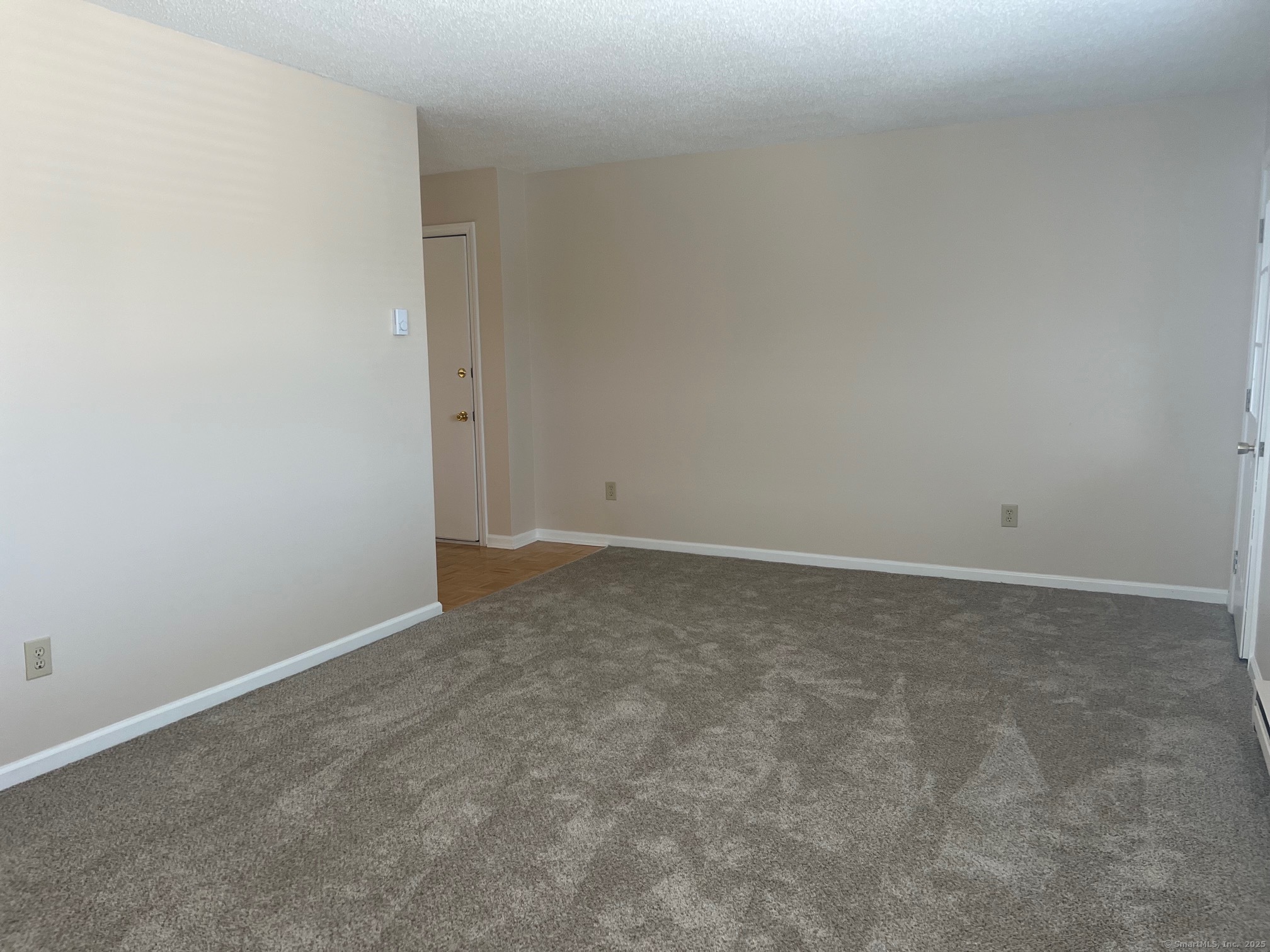 21 Prospect Street, Unit 1 Torrington, CT 06790 - Photo 6 of 13 a view of empty room