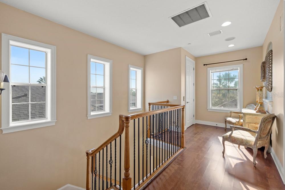 7423 Excitement Drive Reunion, FL 34747 - Photo 47 of 99 a view of a bedroom with furniture and windows