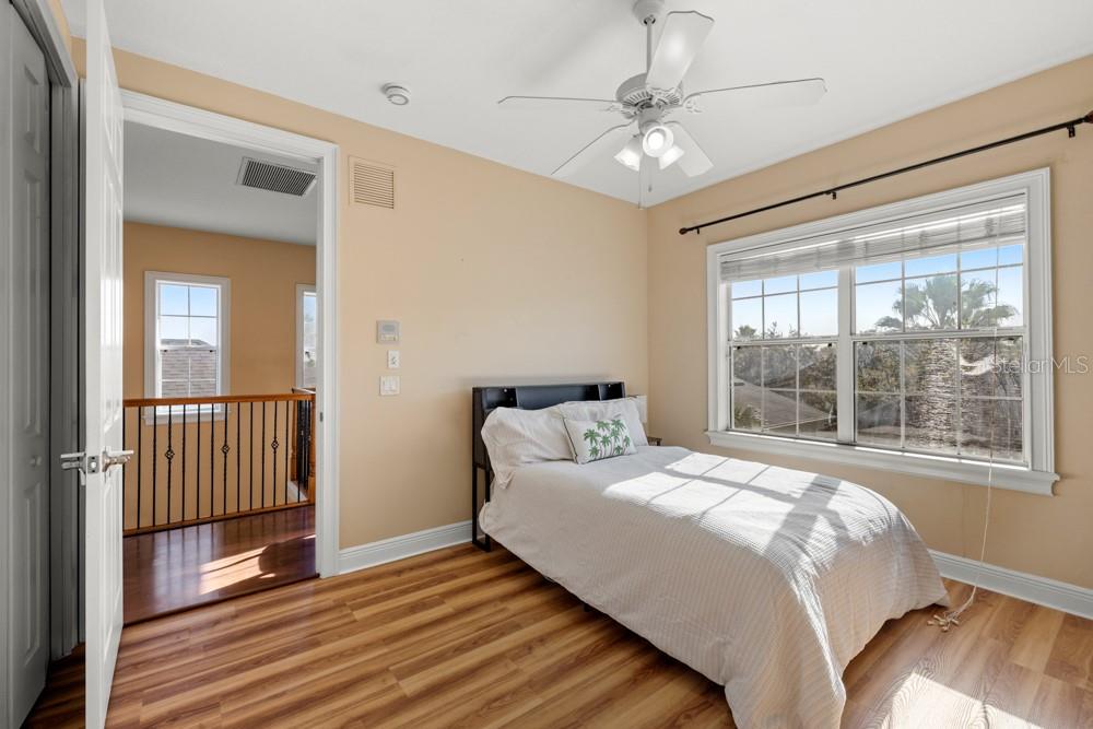 7423 Excitement Drive Reunion, FL 34747 - Photo 50 of 99 a bedroom with a bed and a window