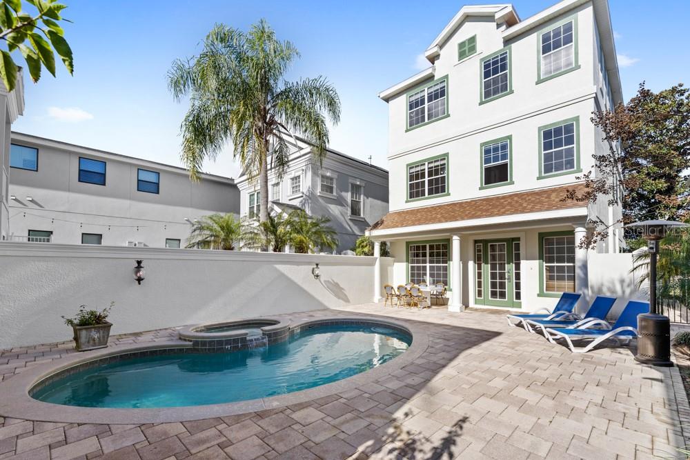 7423 Excitement Drive Reunion, FL 34747 - Photo 54 of 99 a view of outdoor space with seating area and barbeque oven