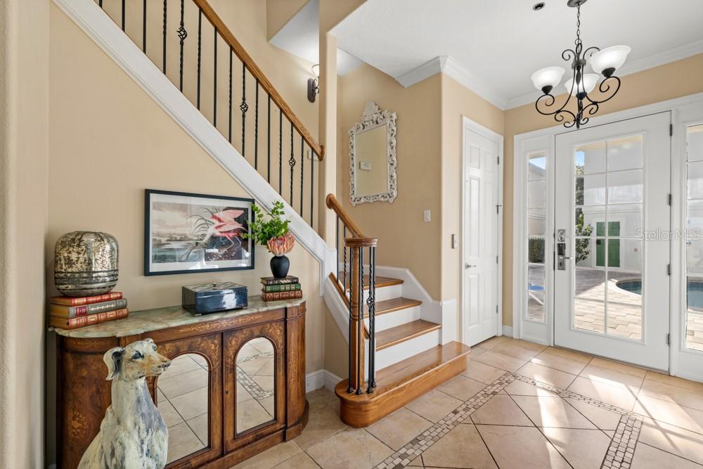 7423 Excitement Drive Reunion, FL 34747 - Photo 6 of 99 a view of an entryway and hall with wooden floor