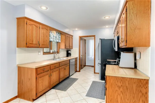 $335,000 | 510 Northeast Thames Drive, Lee's Summit, MO 64086