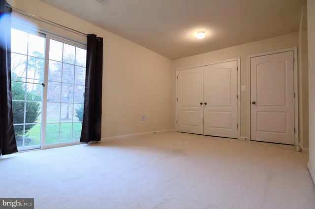 a bathroom with a tub and a shower
