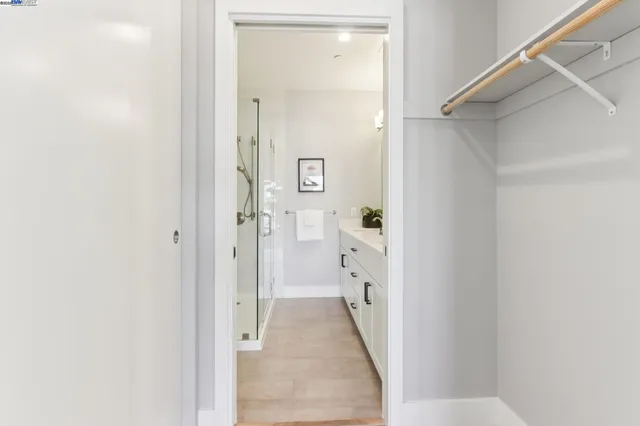 a view of a bathroom from a hallway