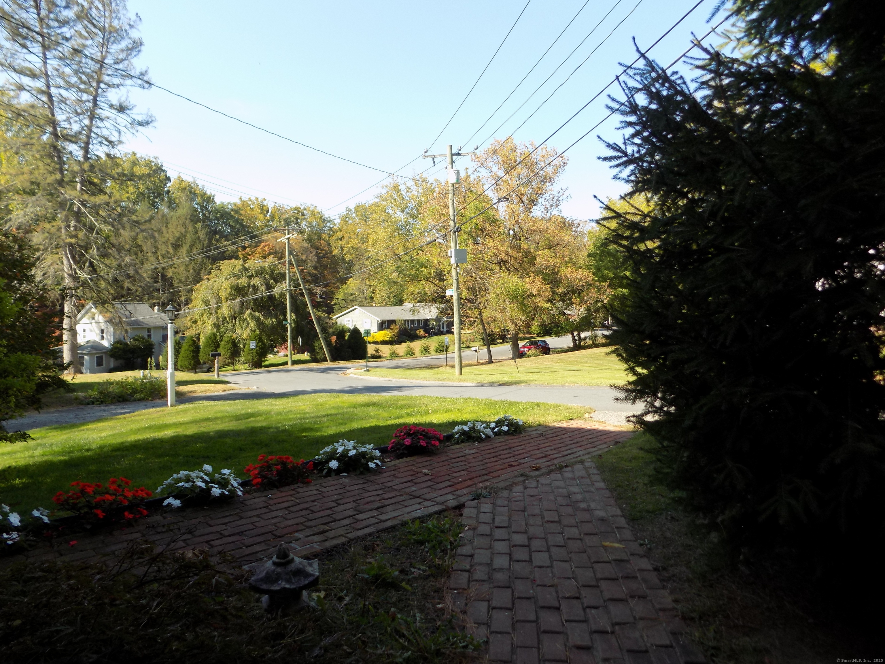 6 Hillside Avenue, Unit B New Milford, CT 06776 - Photo 12 of 12 a view of a garden with an outdoor space