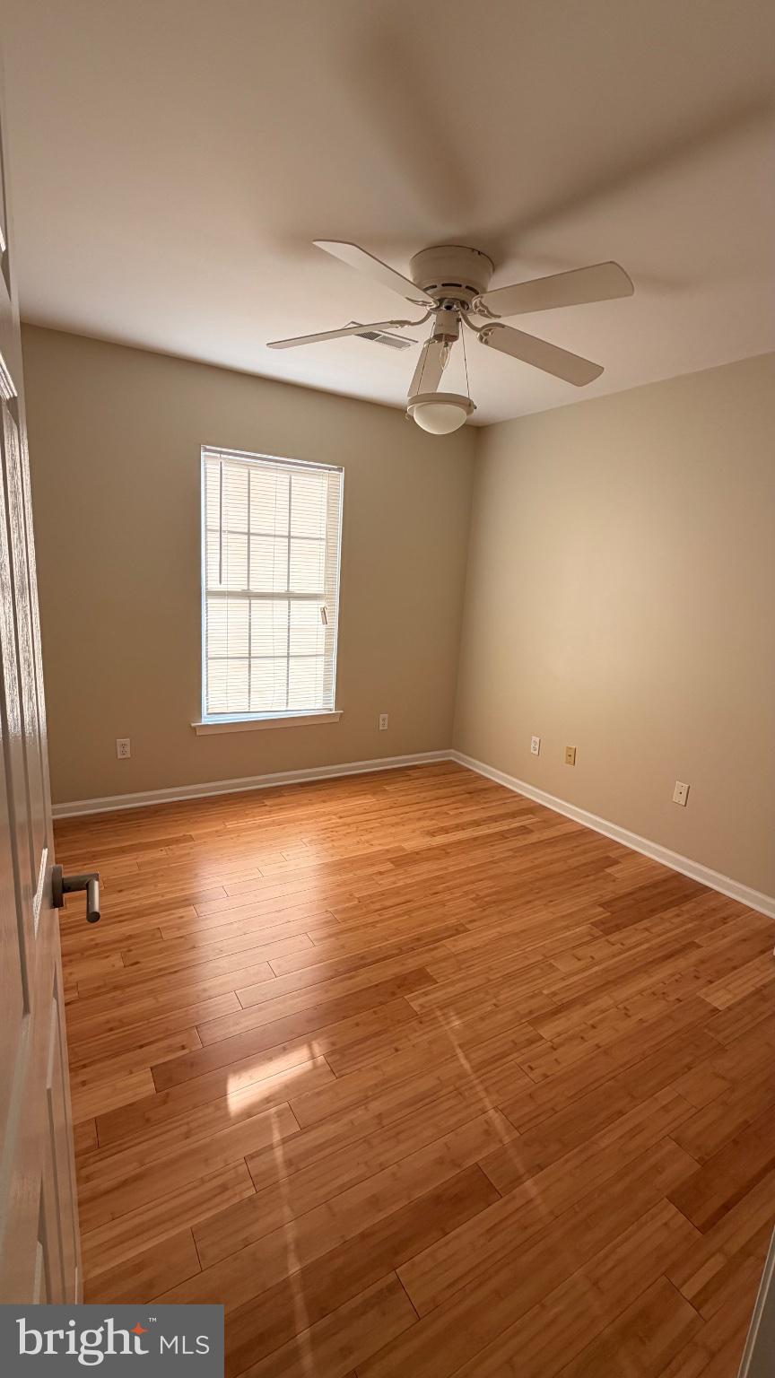 1110 High Street Cambridge, MD 21613 - Photo 13 of 22 Bright and airy room with wood floors.
