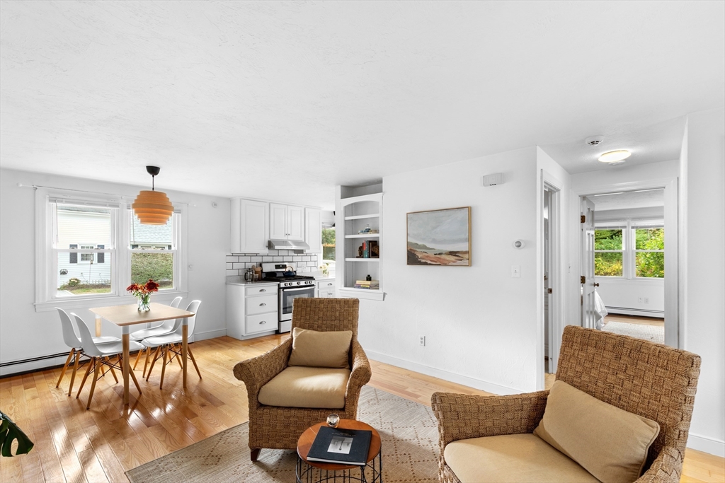 12 State Road, Unit 3D Plymouth, MA 02360 - Photo 15 of 30 a living room with furniture and a large window