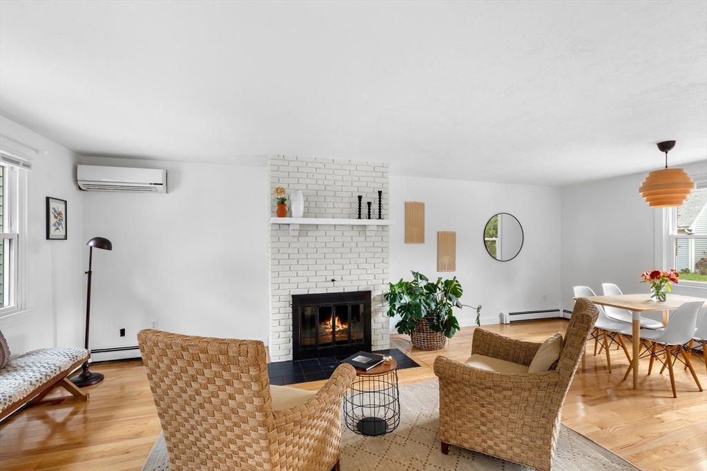 12 State Road, Unit 3D Plymouth, MA 02360 - Photo 16 of 30 a living room with furniture and a fireplace