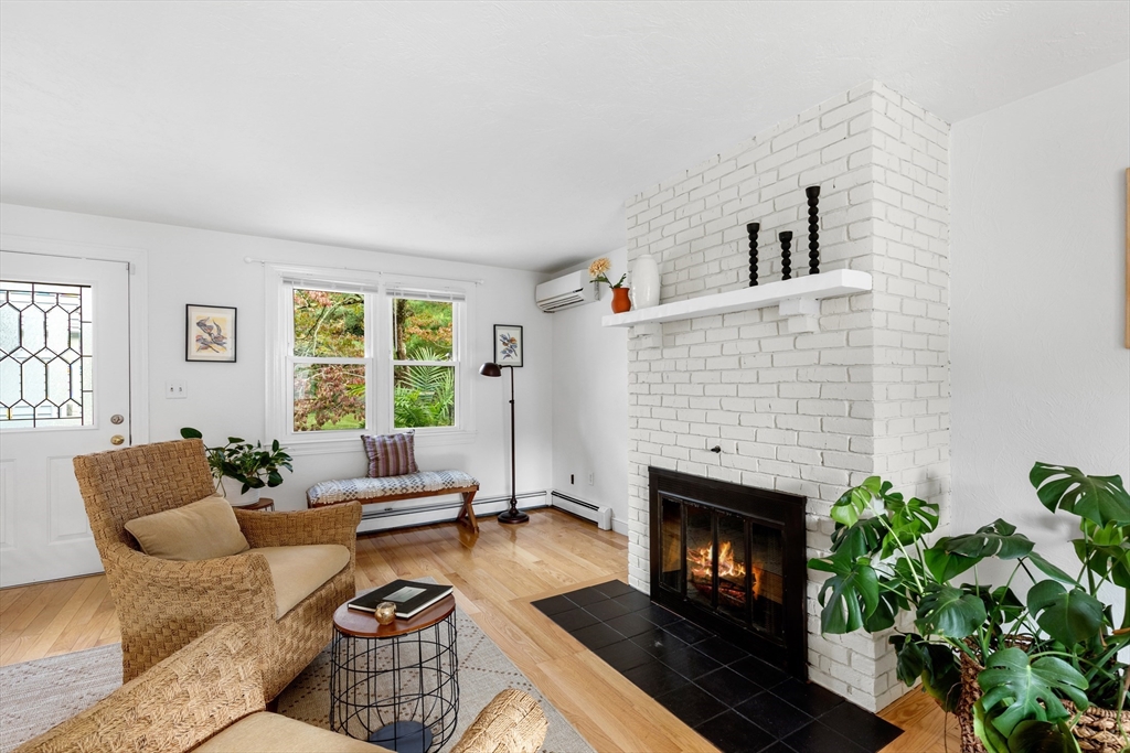 12 State Road, Unit 3D Plymouth, MA 02360 - Photo 17 of 30 a living room with furniture fireplace and window