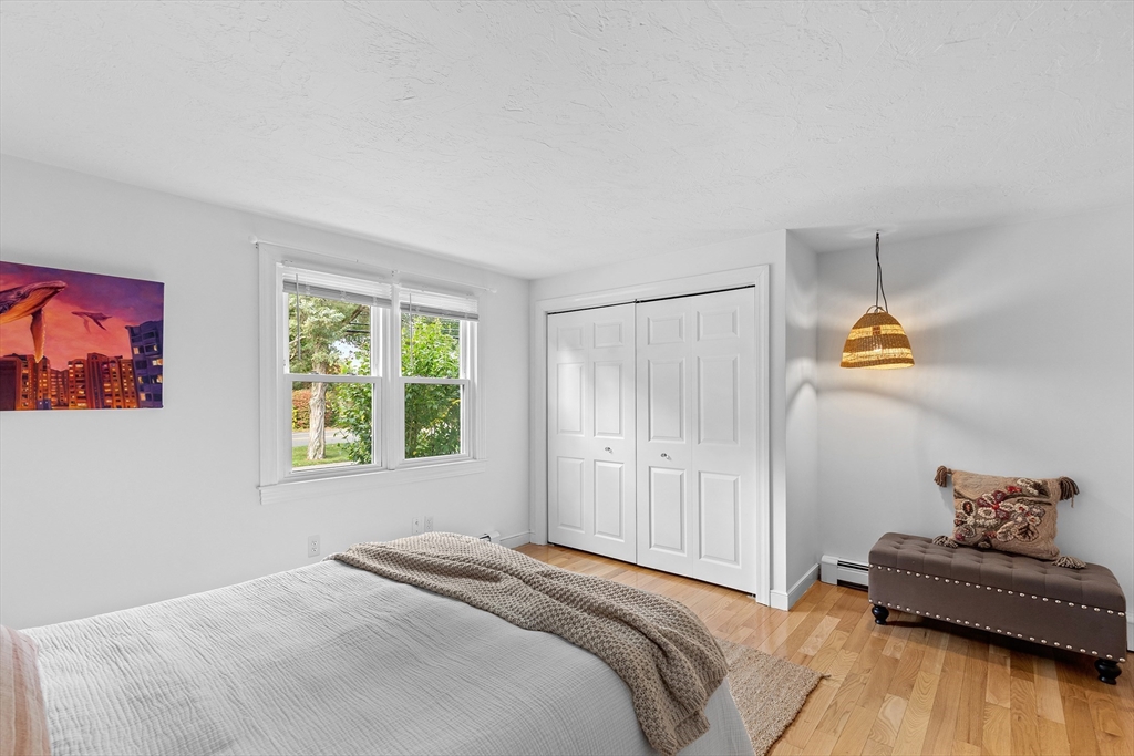 12 State Road, Unit 3D Plymouth, MA 02360 - Photo 24 of 30 a bedroom with a bed and a window