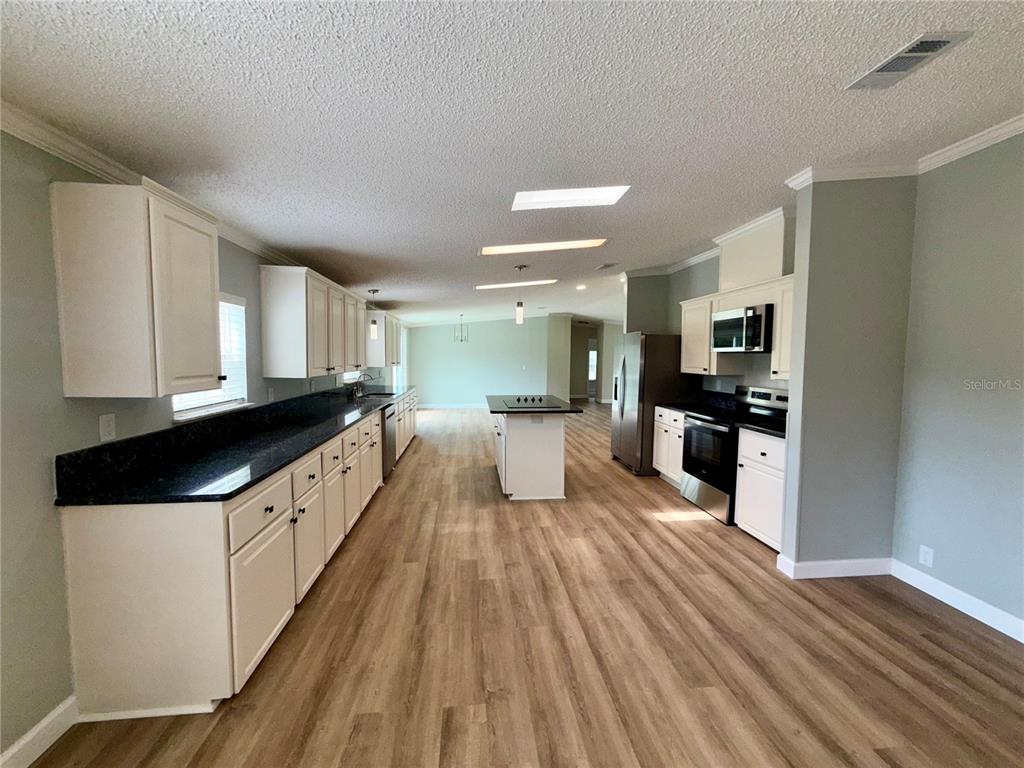 1070 Southwest Mauldin Avenue Lake City, FL 32024 - Photo 13 of 31 a large kitchen with a lot of counter space