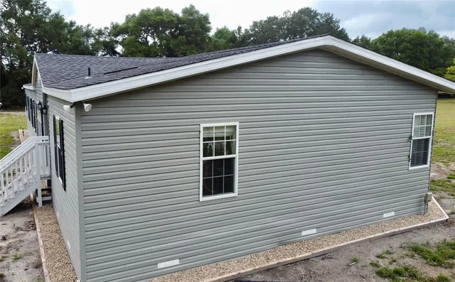 a side view of a white house