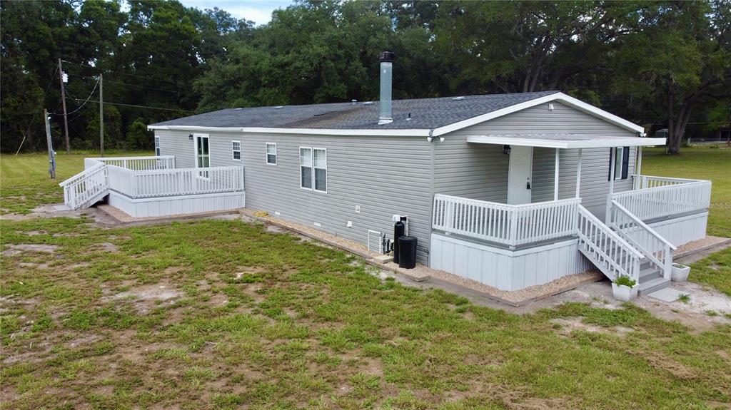 1070 Southwest Mauldin Avenue Lake City, FL 32024 - Photo 7 of 31 a front view of a house with a yard