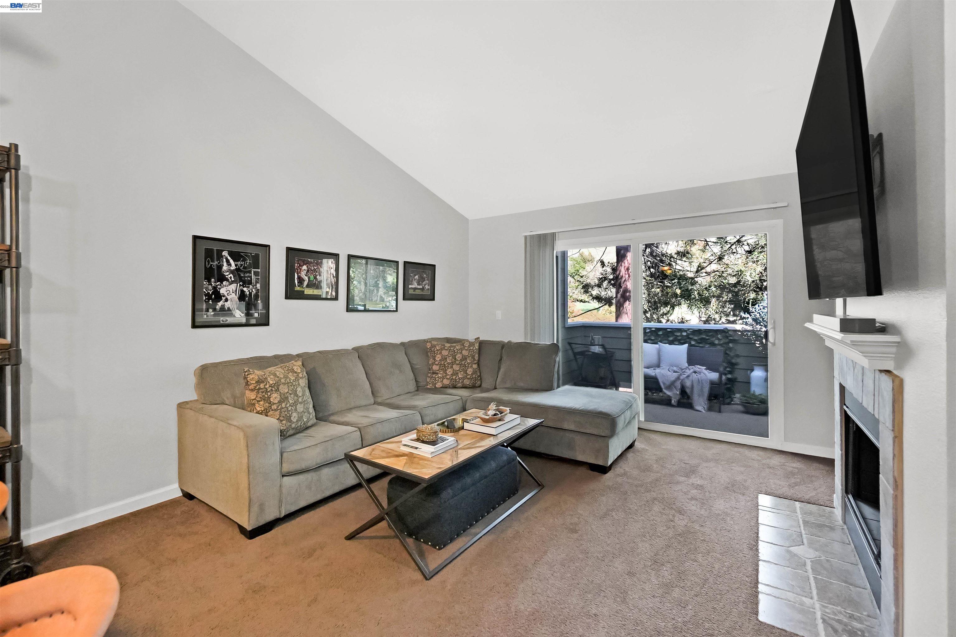 200 Reflections Drive, Unit 23 San Ramon, CA 94583 - Photo 19 of 56 a living room with furniture and a flat screen tv