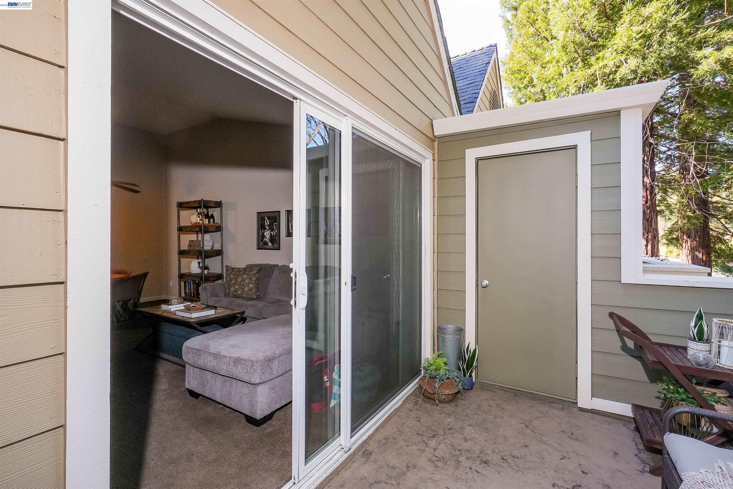 200 Reflections Drive, Unit 23 San Ramon, CA 94583 - Photo 39 of 56 a backyard of a house with barbeque oven table and chairs