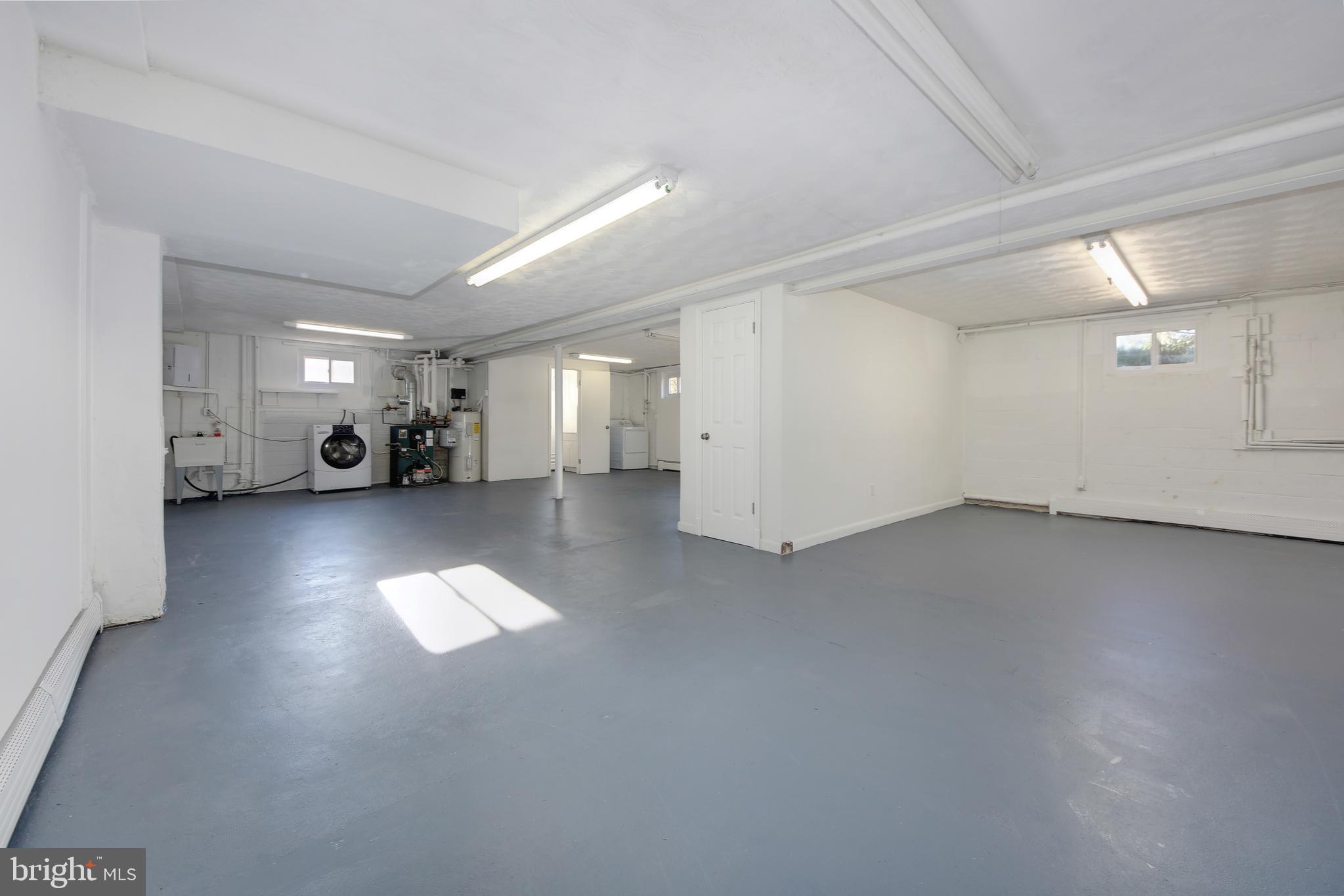 4846 Long View Road Temple Hills, MD 20748 - Photo 19 of 39 Semi-Finished lower level with tons of storage