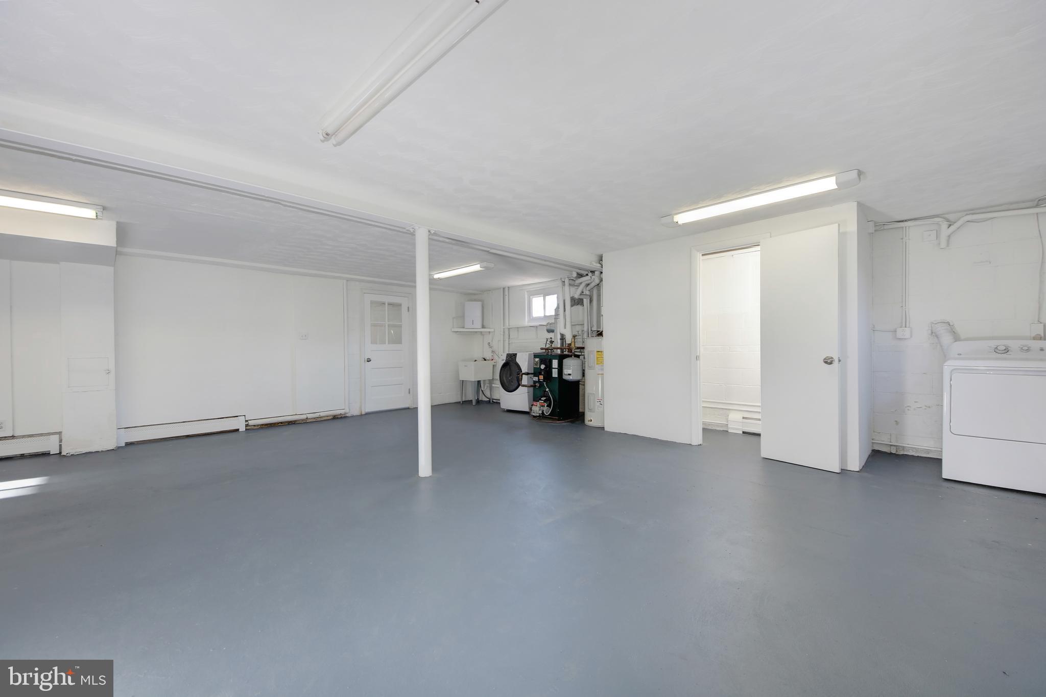 4846 Long View Road Temple Hills, MD 20748 - Photo 20 of 39 Semi Finished Lower Level with washer/dryer