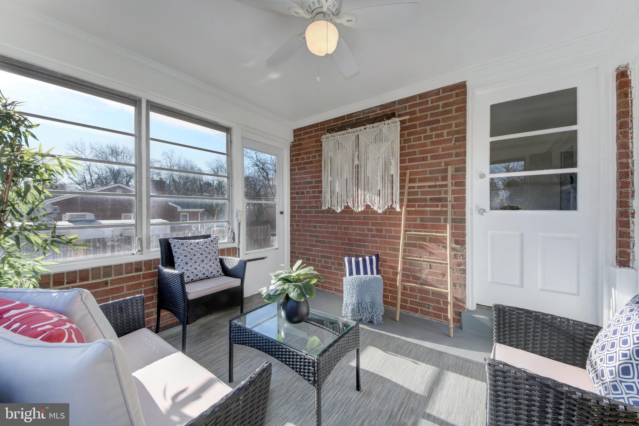 4846 Long View Road Temple Hills, MD 20748 - Photo 7 of 39 Sunroom off of kitchen for indoor outdoor living