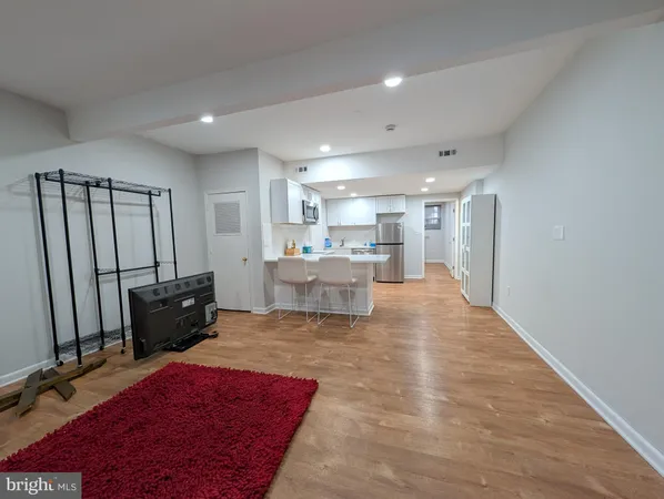 a living room with furniture and a couch