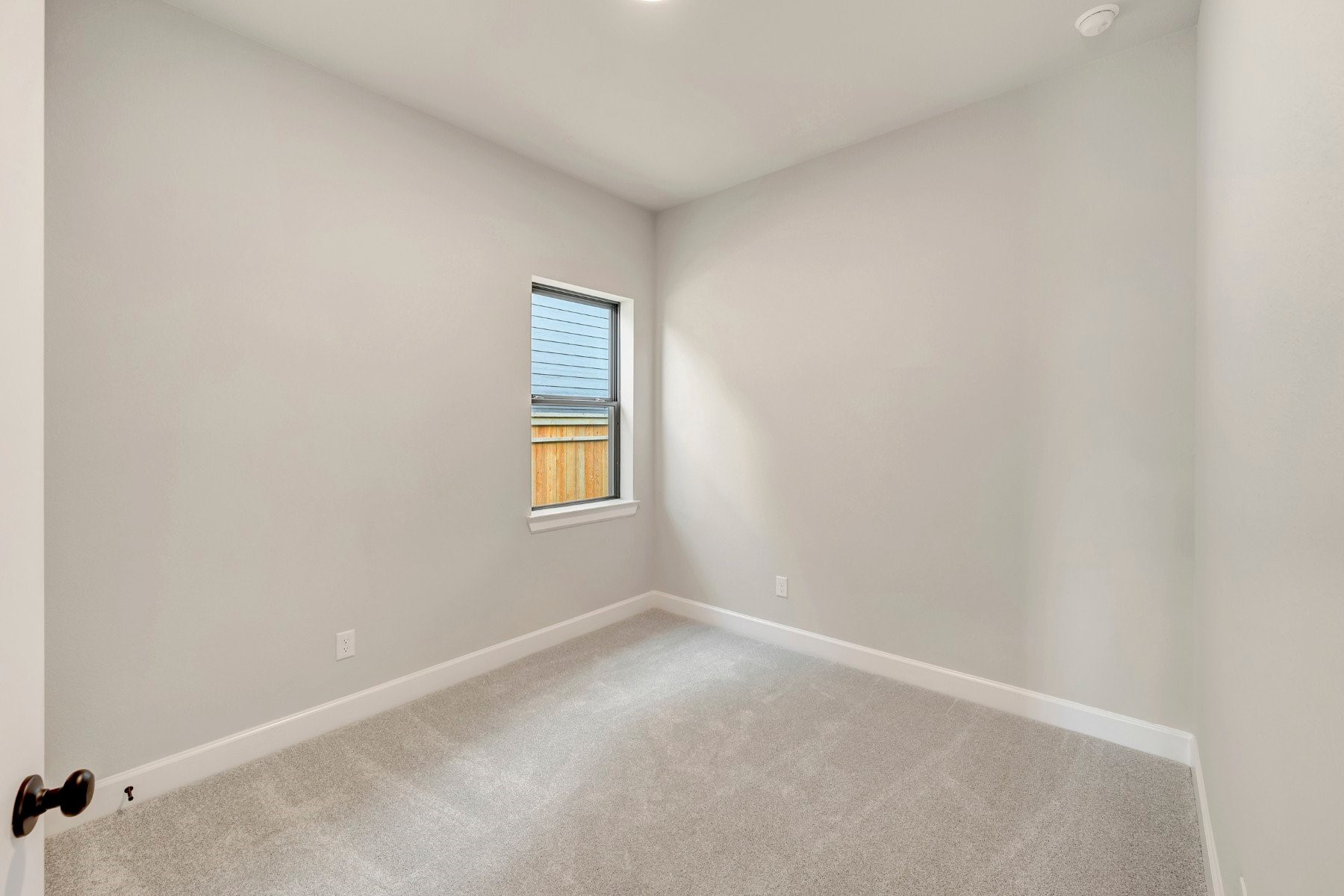 2722 Cottage Place Rosharon, TX 77583 - Photo 19 of 50 a view of an empty room with a window