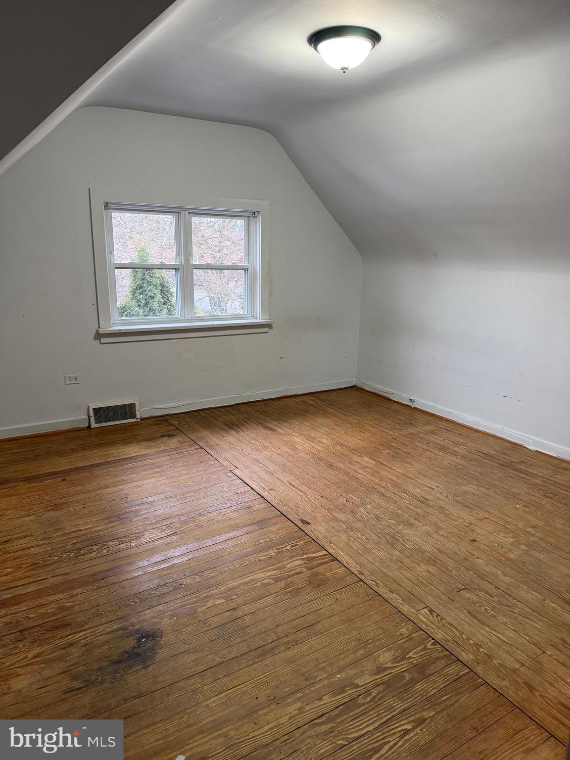 333 East Locust Street Lebanon, PA 17042 - Photo 12 of 17 an empty room with wooden floor and windows