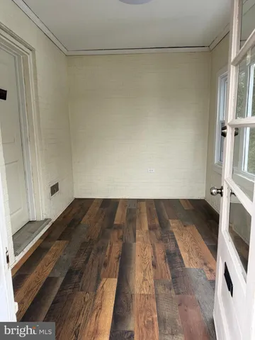 a view of wooden floor and staircase