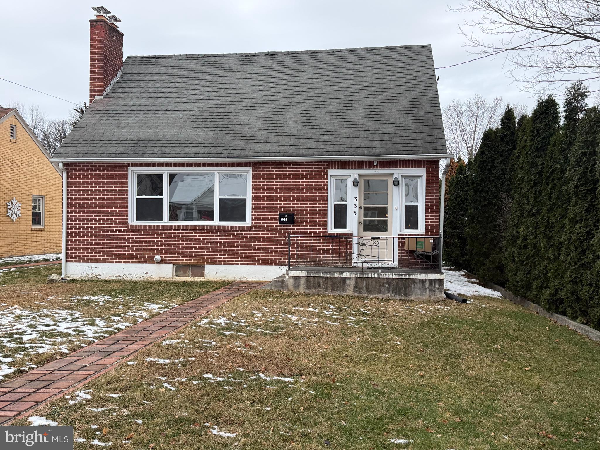 333 East Locust Street Lebanon, PA 17042 - Photo 2 of 17 a house that has a window in front of it