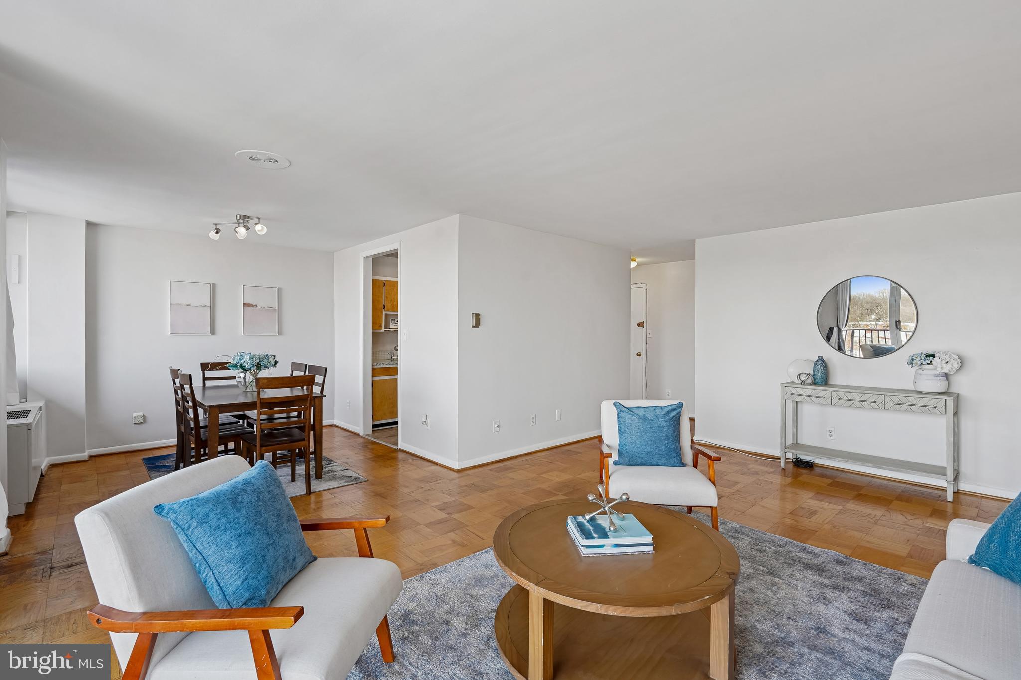4343 Cherry Hill Road, Unit 705 Arlington, VA 22207 - Photo 2 of 38 a living room with furniture and a wooden floor