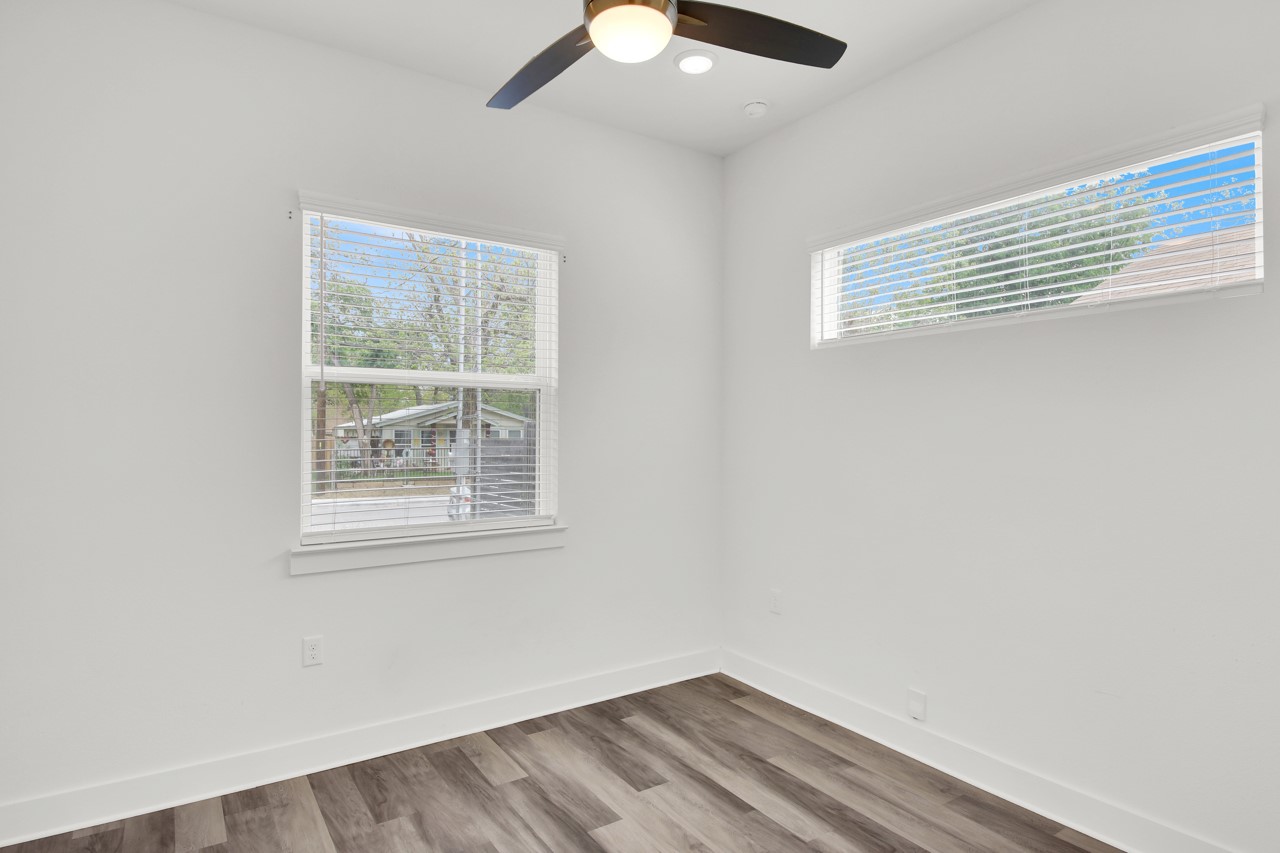 6325 Ponca Street, Unit B Austin, TX 78741 - Photo 15 of 29 Spare room with ceiling fan and light wood-style flooring