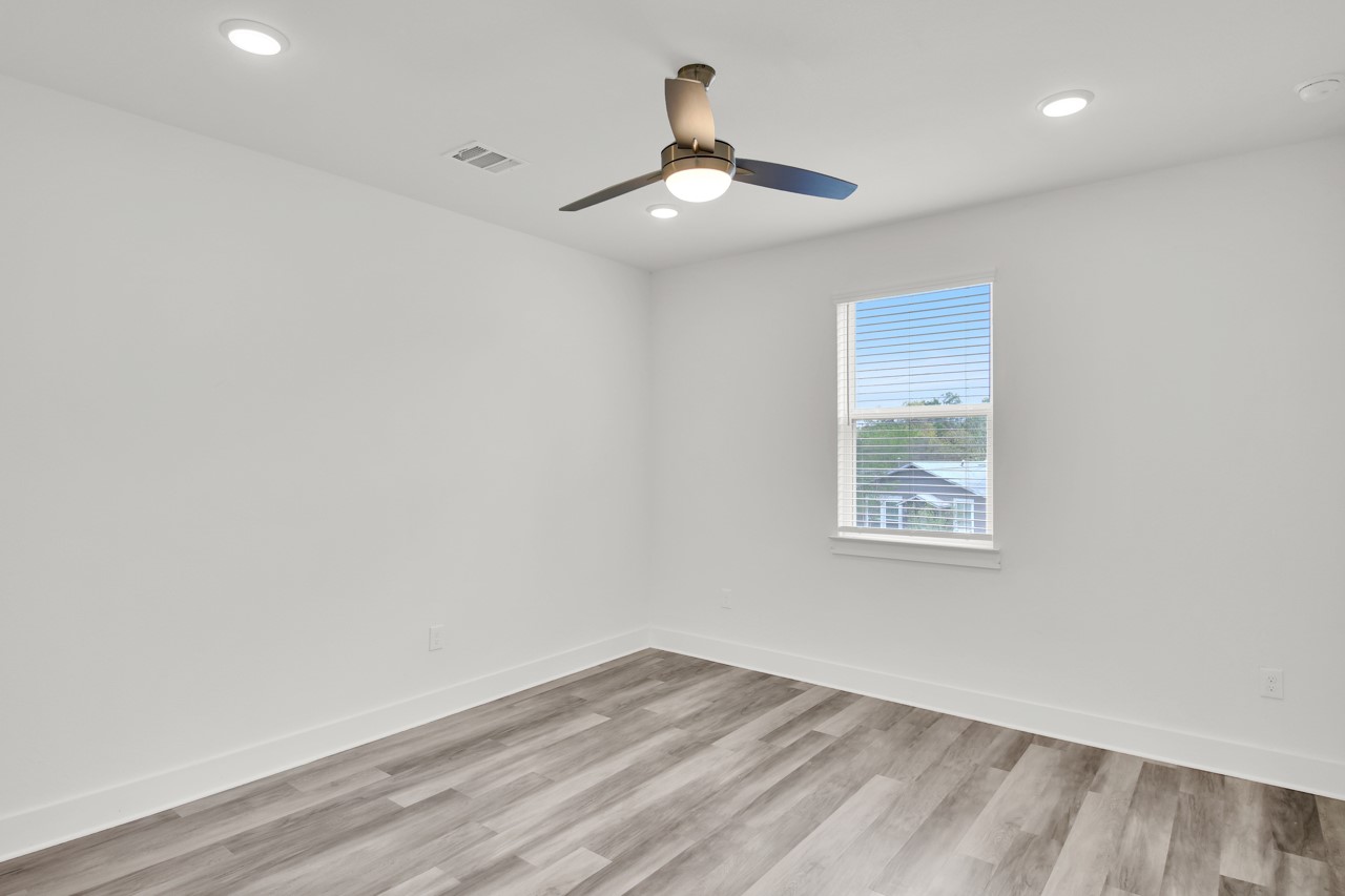6325 Ponca Street, Unit B Austin, TX 78741 - Photo 22 of 29 Spare room featuring light wood-type flooring, recessed lighting, and a ceiling fan