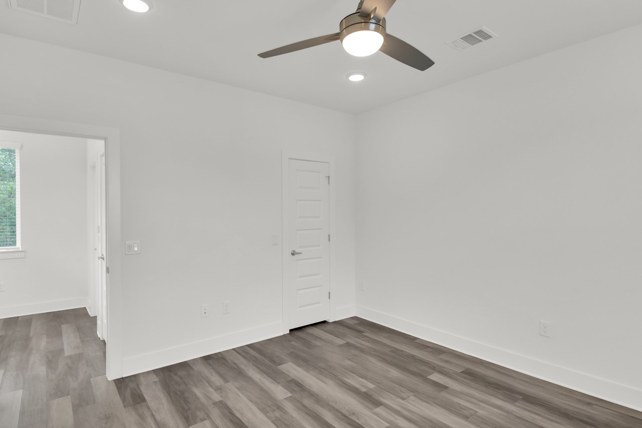 6325 Ponca Street, Unit B Austin, TX 78741 - Photo 23 of 29 Unfurnished room featuring recessed lighting, light wood finished floors, and ceiling fan