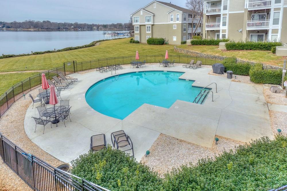 1332 Torrence Circle, Unit 1332 Davidson, NC 28036 - Photo 21 of 24 an aerial view of a house with outdoor space and lake view
