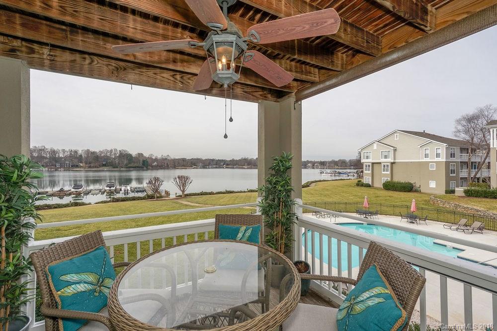 1332 Torrence Circle, Unit 1332 Davidson, NC 28036 - Photo 22 of 24 a view of a swimming pool with a patio