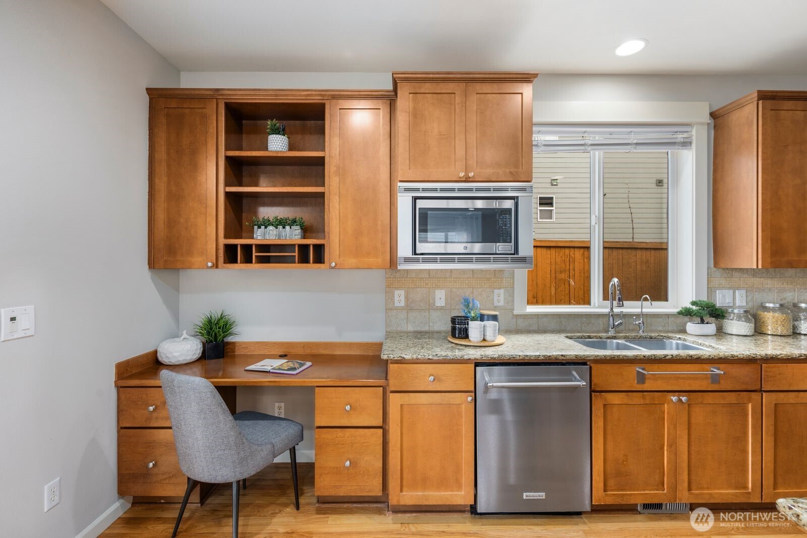 5620 Northeast 6th Place Renton, WA 98059 - Photo 16 of 37 a kitchen with a sink cabinets and window