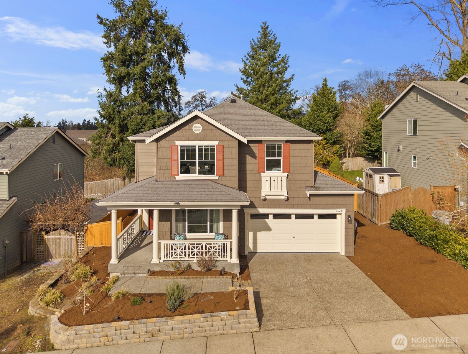 5620 Northeast 6th Place Renton, WA 98059 - Photo 2 of 37 a front view of a house with a yard